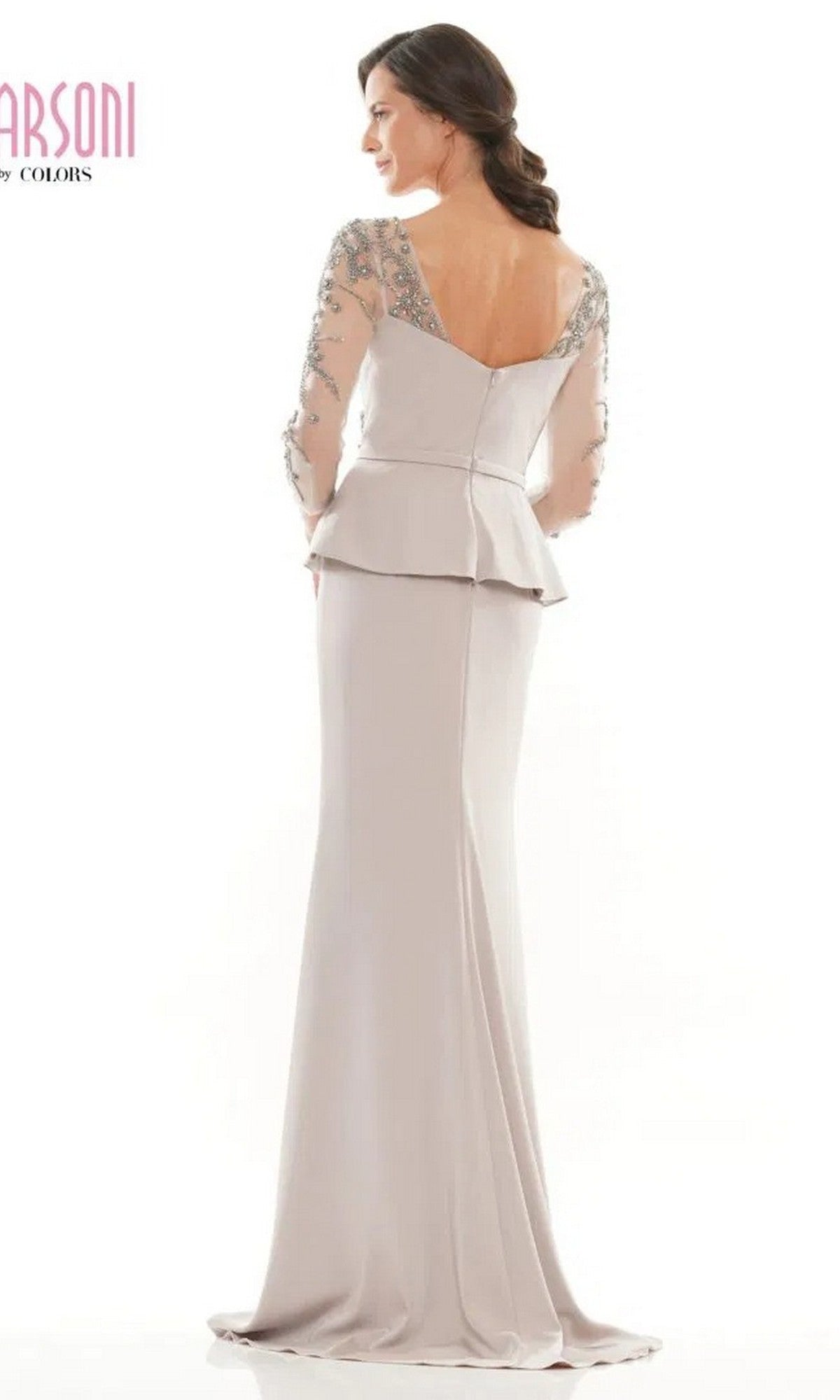 A woman in the Marsoni MV1037 long formal dress exudes timeless sophistication in this elegant, embellished trumpet gown.